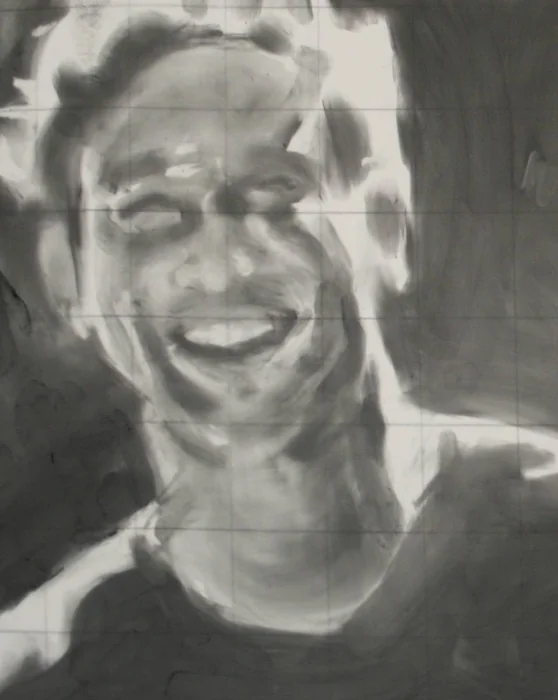 A smiling face emerges from softly shaded graphite.